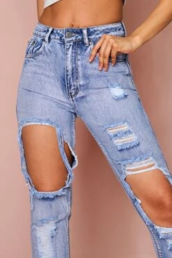Extreme Distressed Mom Jean -Ladies Clothing Shop light blue extreme distressed mom jean 3