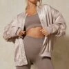 Oversized Shoulder Pad Detail Satin Bomber -Ladies Clothing Shop stone oversized shoulder pad detail satin bomber